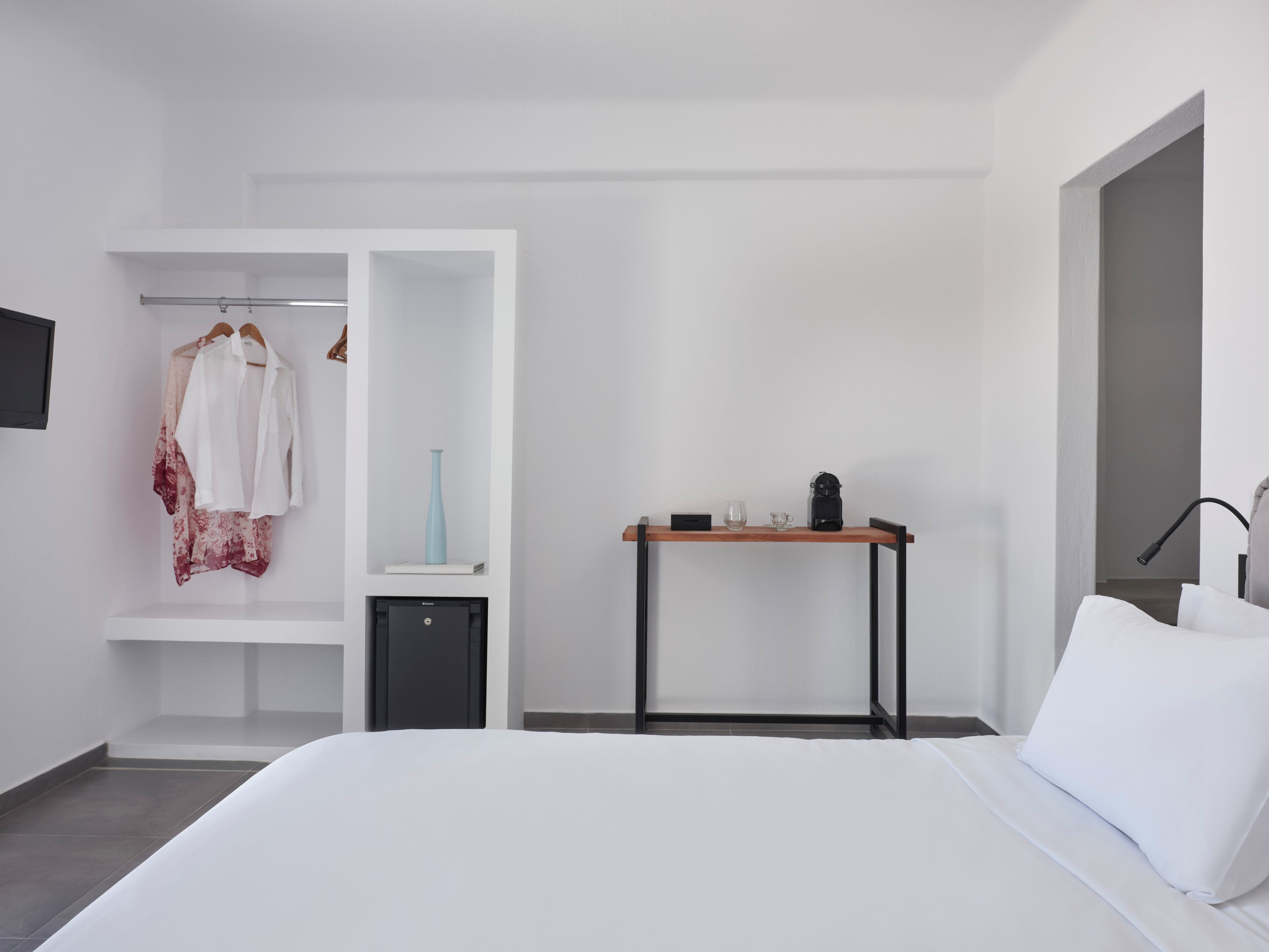 Hypo-allergenic bedding, down duvets, pillow-top beds, minibar