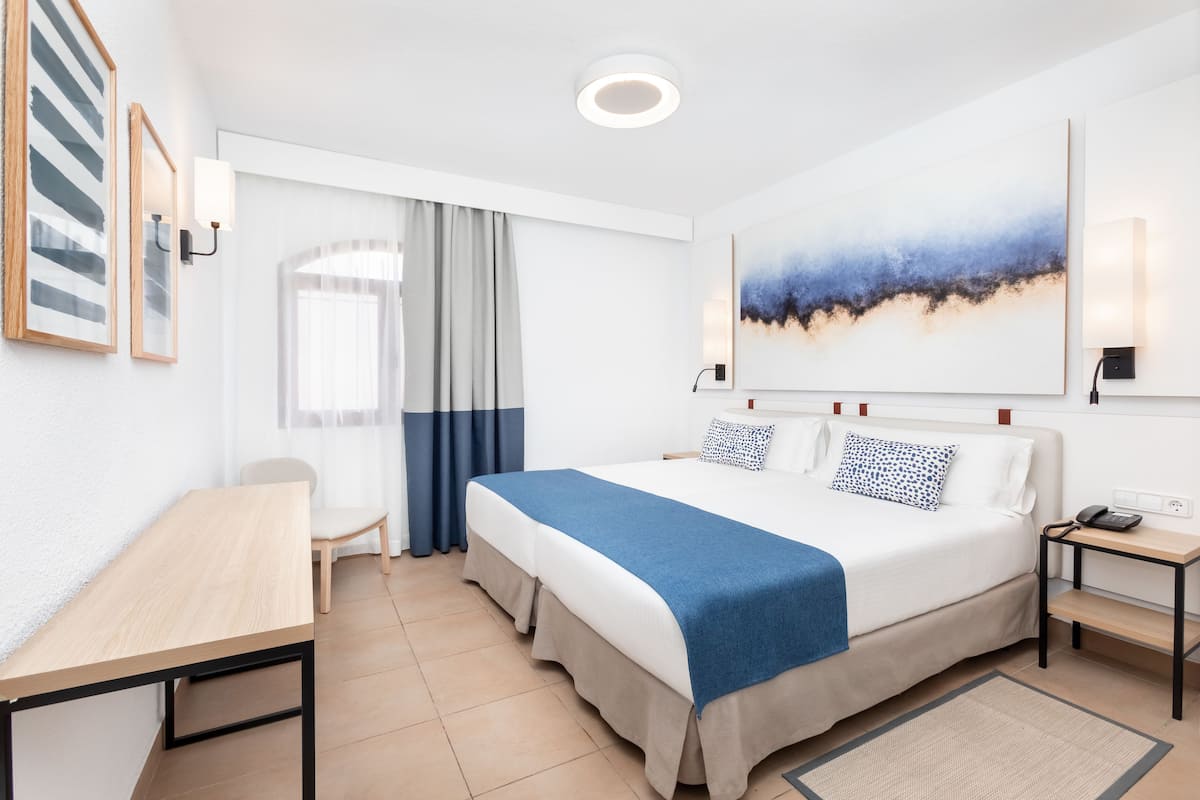 in-room safe, desk, blackout curtains, iron/ironing board