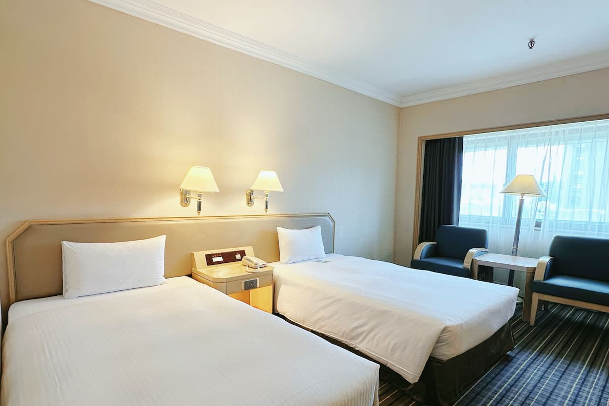 Standard Twin Room, 2 Twin Beds | In-room safe, blackout drapes, soundproofing, bed sheets