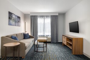 Suite, 1 chambre | Coin séjour