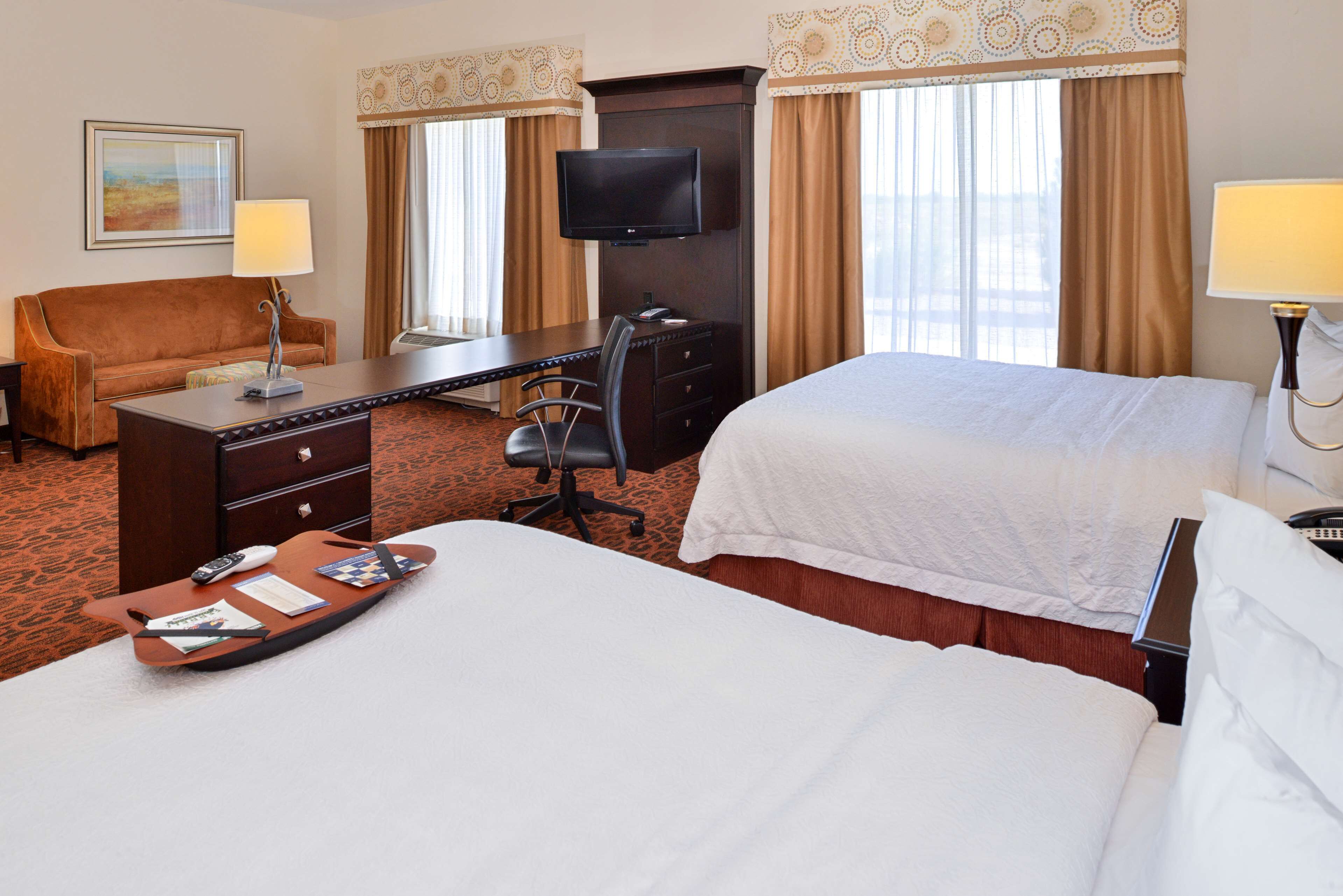 suite, 2 queen beds, non smoking | in-room safe, iron/ironing board, free cots/infant beds