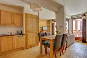 Apartment, 1 Bedroom | Living area | Flat-screen TV