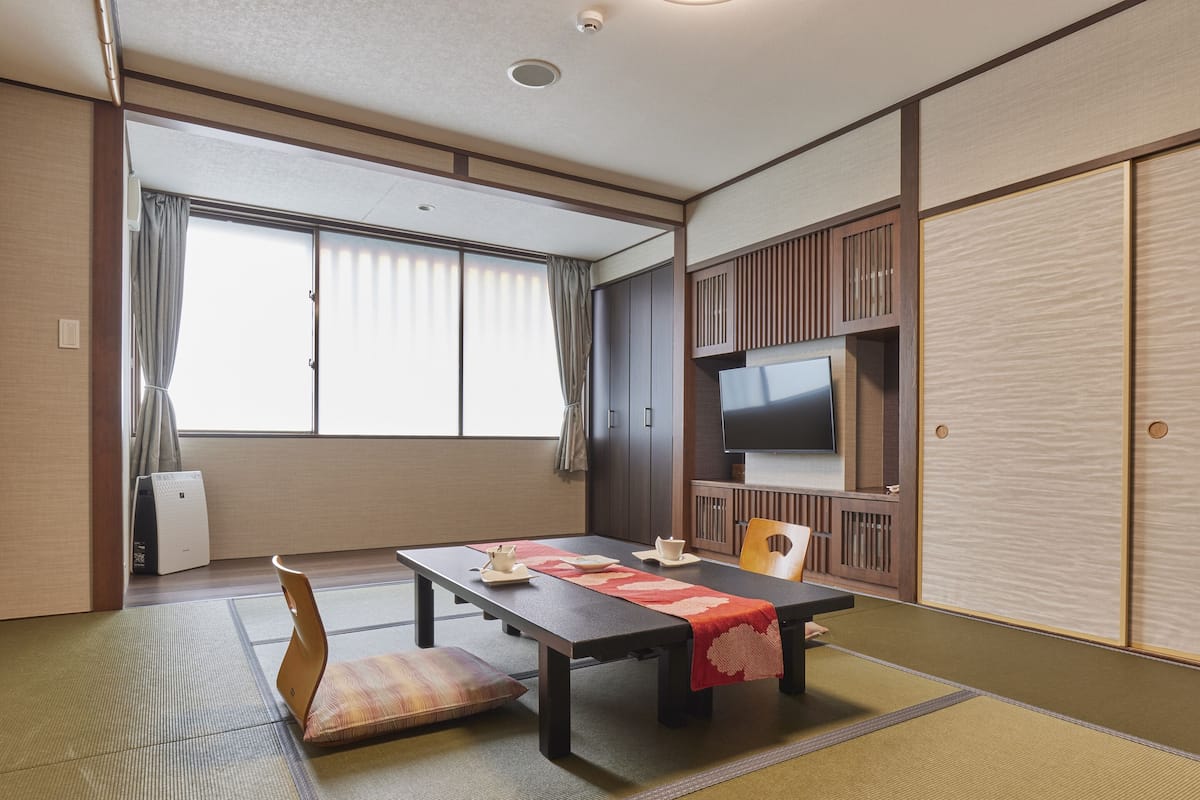 Economy Quadruple Room | 1 bedroom, down comforters, free WiFi