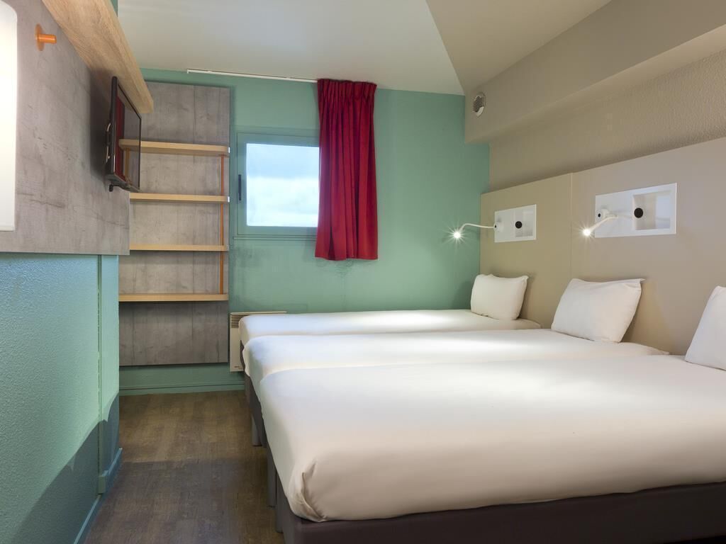 Desk, blackout curtains, free cots/infant beds, free WiFi