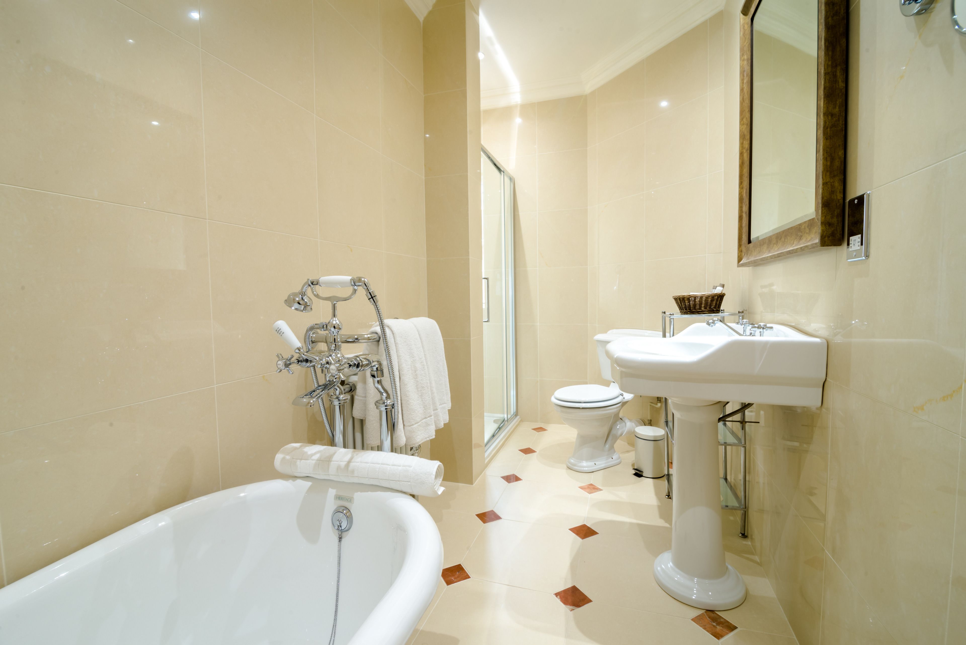 large main house room | bathroom | deep-soaking bathtub, free toiletries, hair dryer, bathrobes