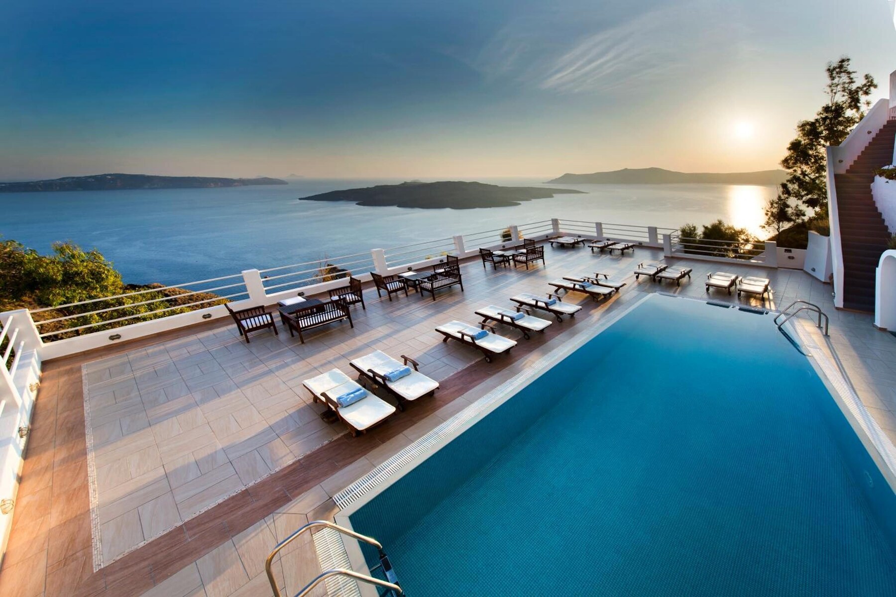 Seasonal outdoor pool, pool umbrellas, pool loungers
