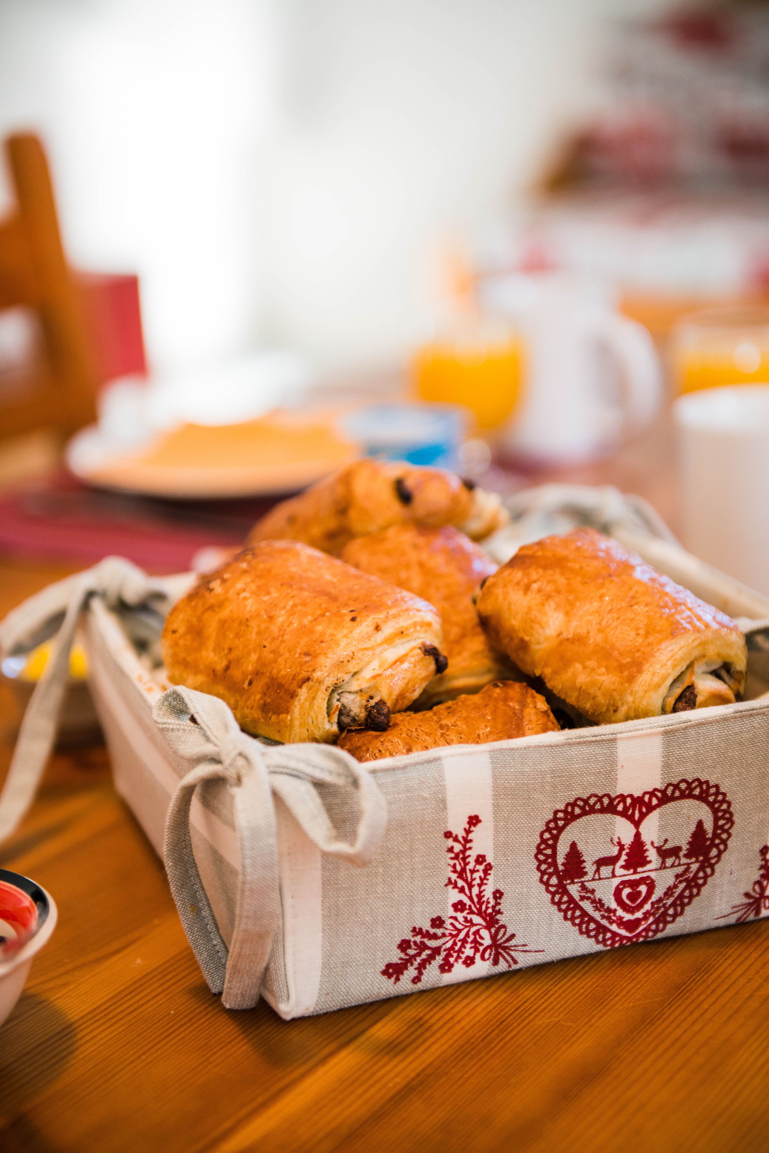 A tray of pastries on a table.