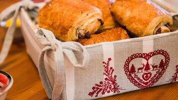A tray of pastries on a table.