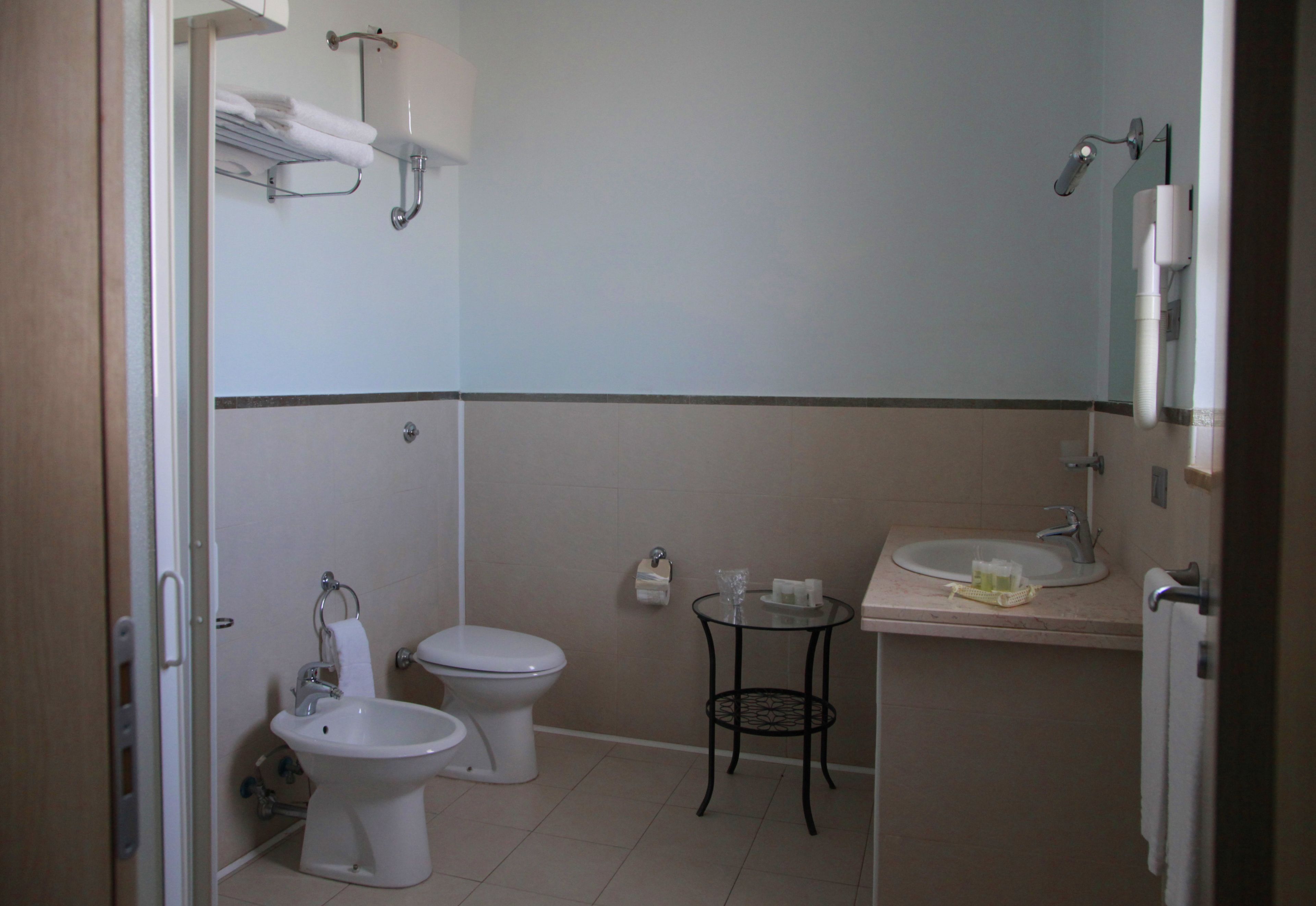 shower, free toiletries, hair dryer, slippers