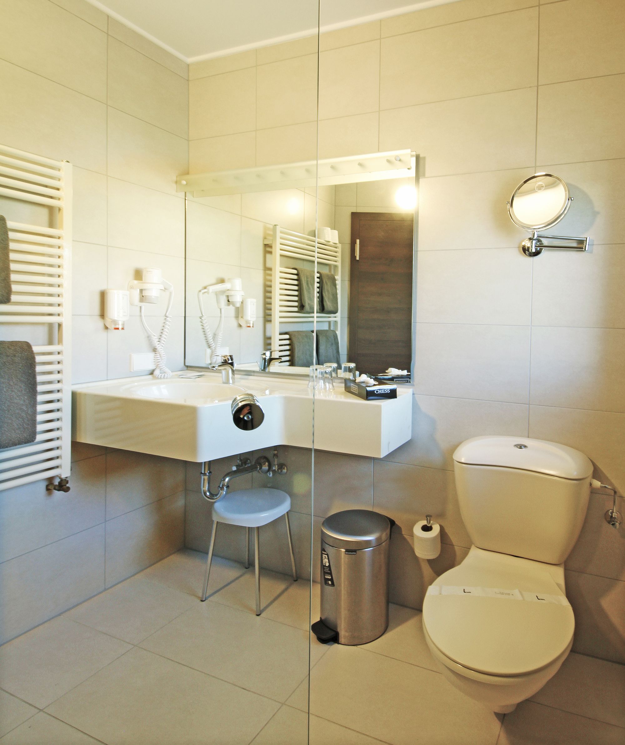 shower, rainfall showerhead, hair dryer, towels