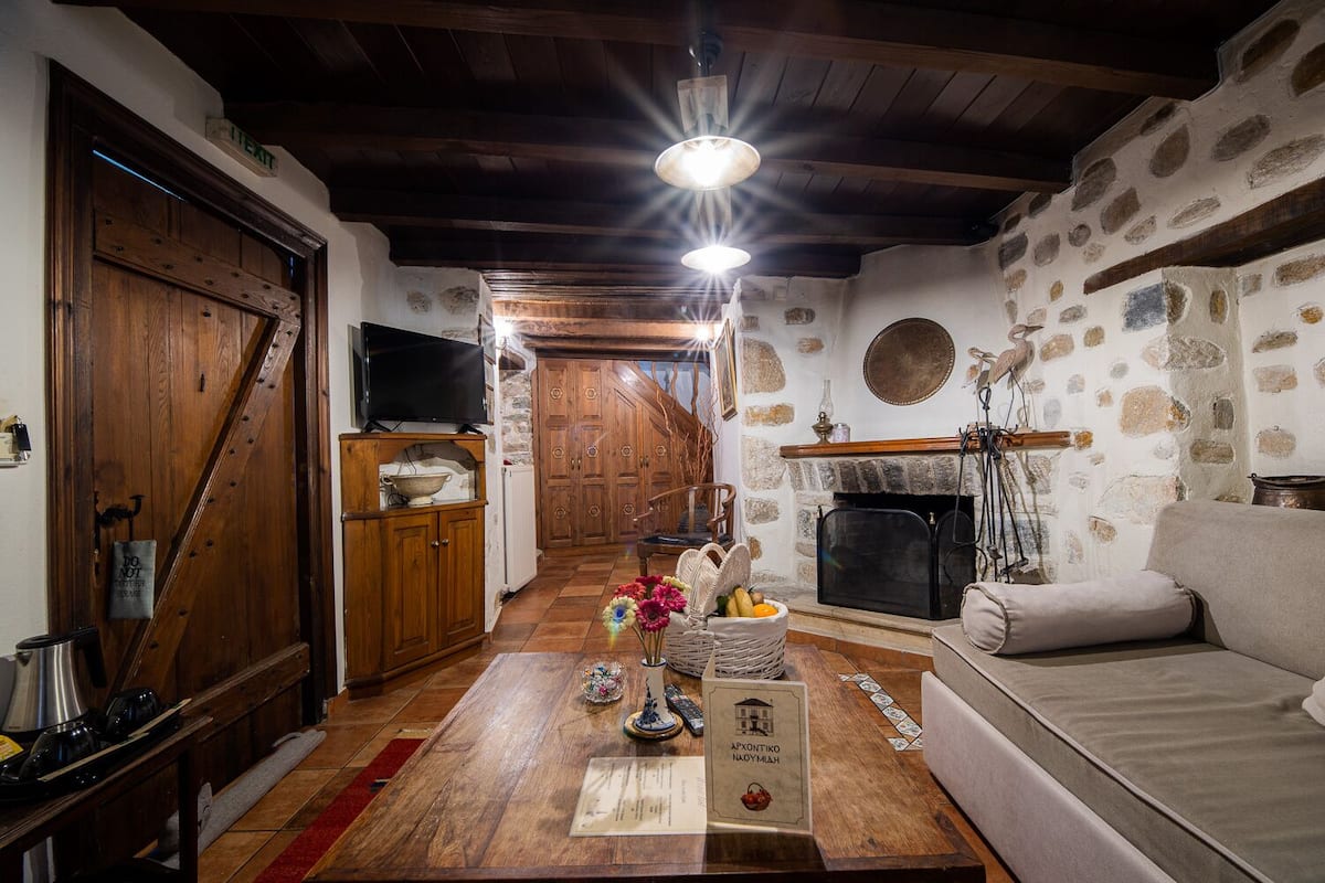 Junior Suite, Fireplace, Garden View | 1 bedroom, premium bedding, minibar, iron/ironing board