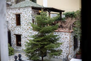Junior Suite, Fireplace, Garden View | Premium bedding, minibar, iron/ironing board, free WiFi