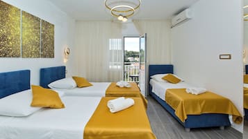 Superior Triple Room, Balcony, Sea View | In-room safe, free WiFi