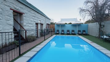 Outdoor pool, pool umbrellas, pool loungers