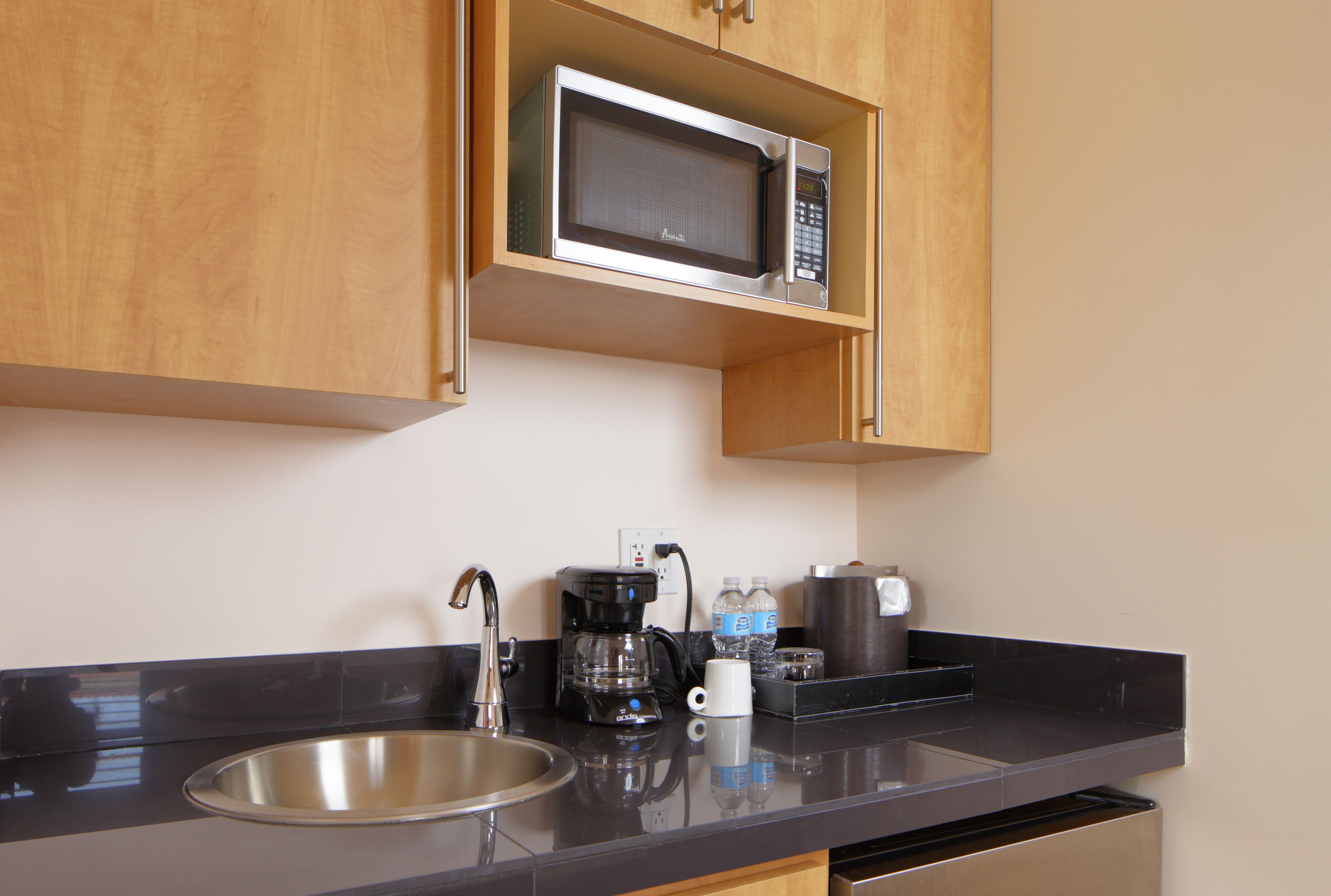 deluxe studio suite | private kitchen | fridge, microwave, coffee/tea maker