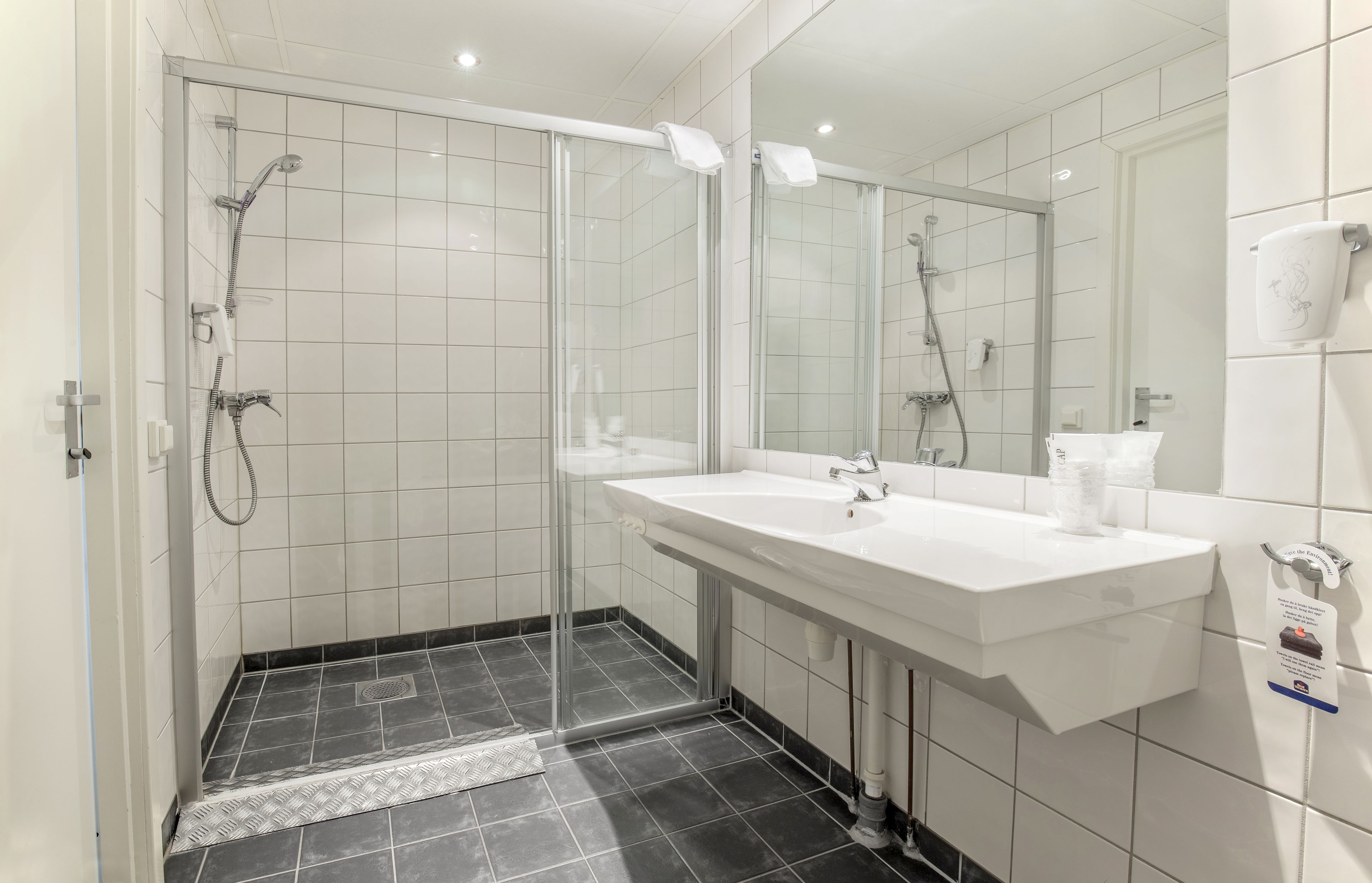 Suite, 1 King Bed, Non Smoking | Bathroom | Shower, hair dryer, heated floors, towels