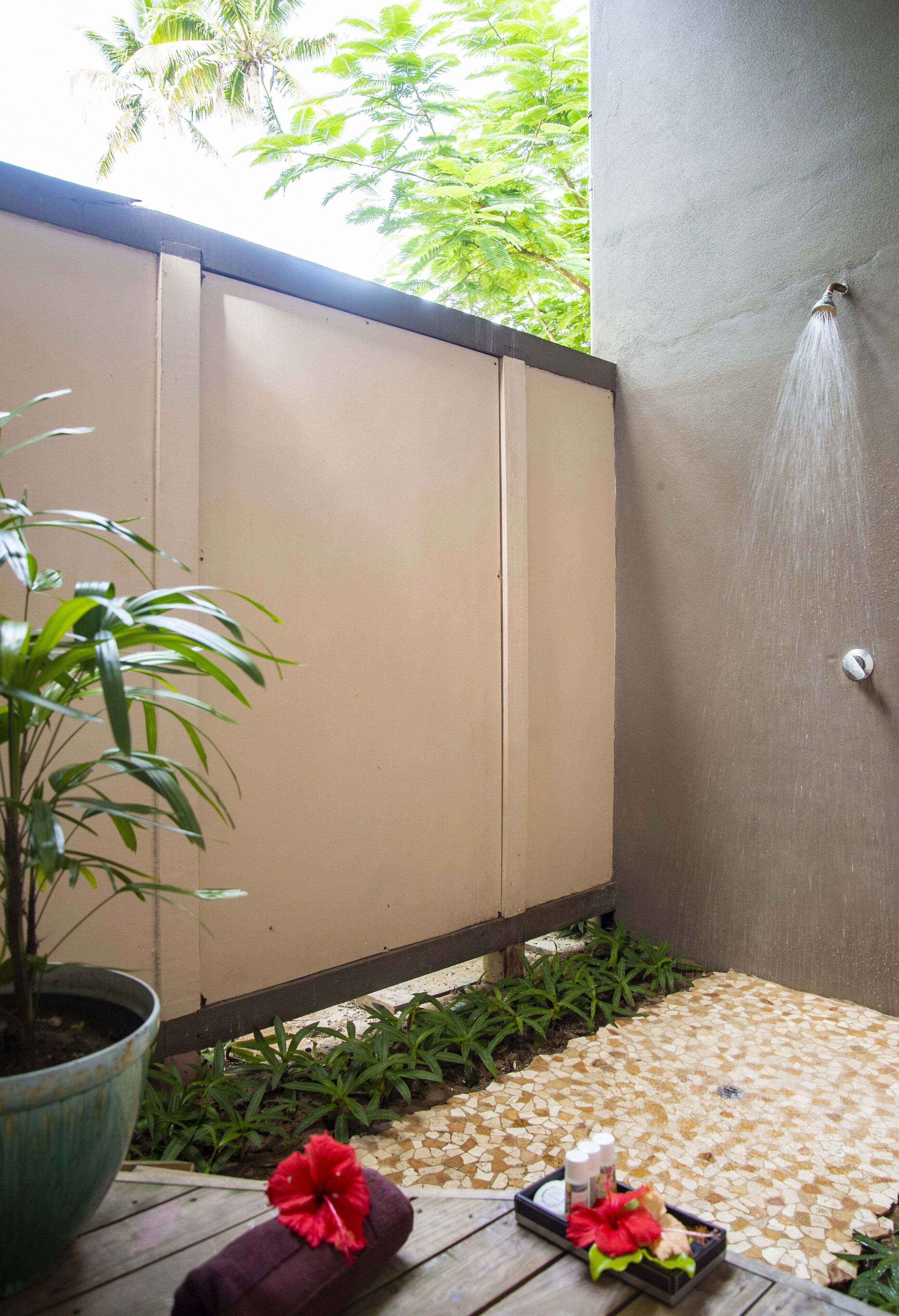 beachfront bure | bathroom | shower, free toiletries, towels