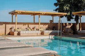 Outdoor pool, pool umbrellas, pool loungers