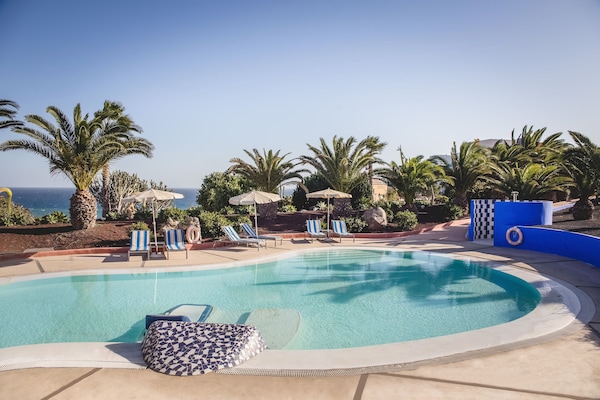 2 outdoor pools, sun loungers