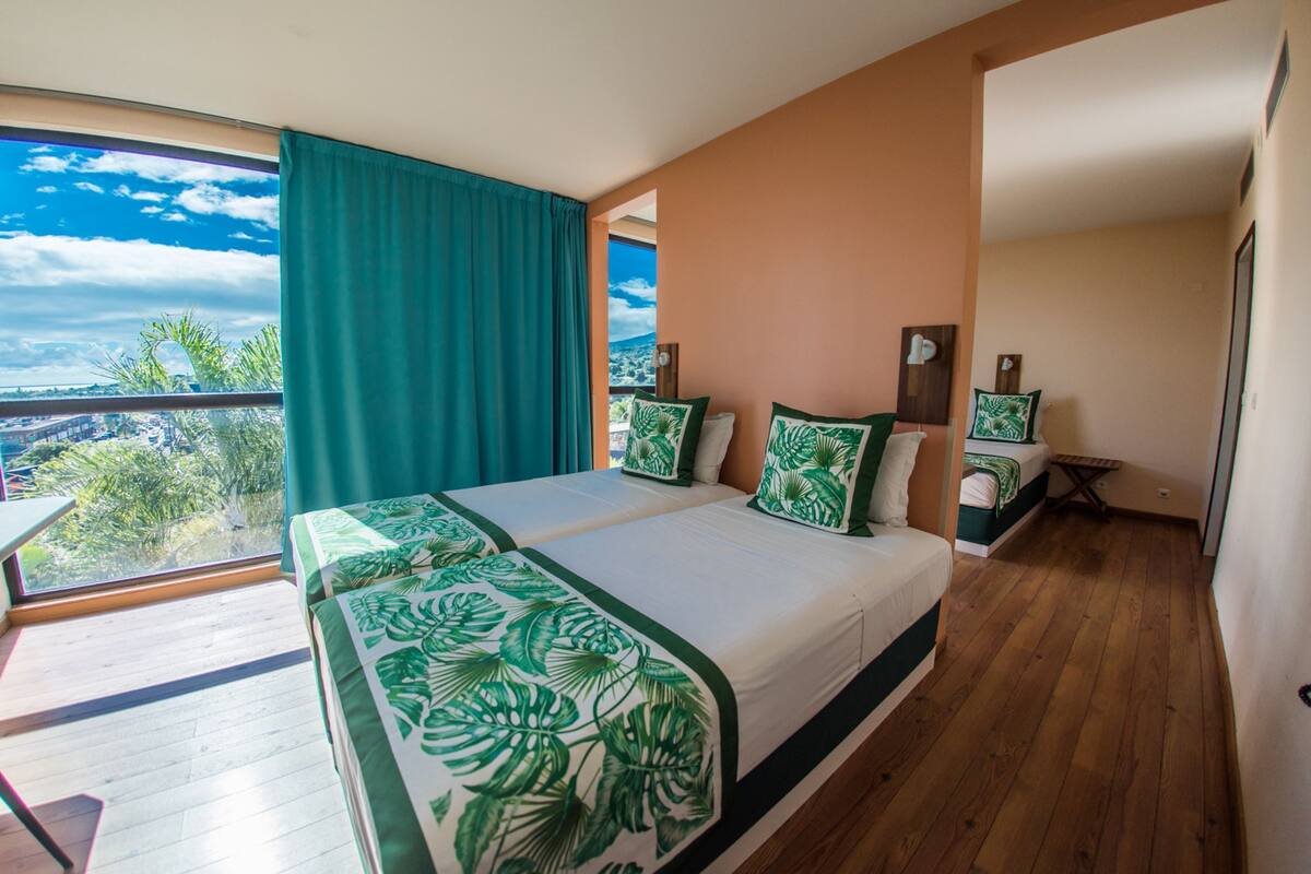 Family Room | Premium bedding, Select Comfort beds, blackout drapes, soundproofing