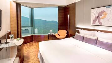 City view room | 1 bedroom, free minibar items, in-room safe, individually furnished