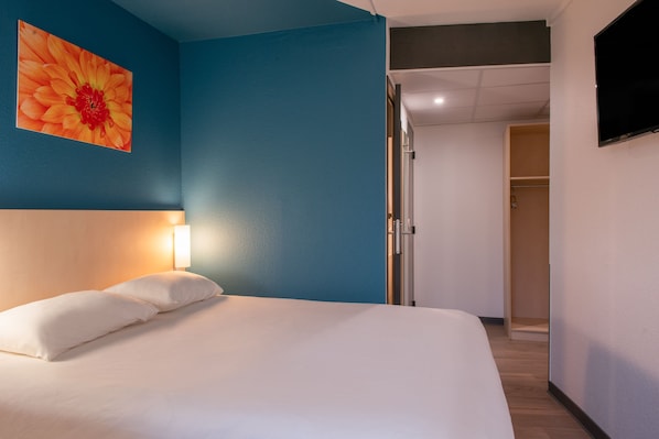 Shower, eco-friendly toiletries, hair dryer, towels