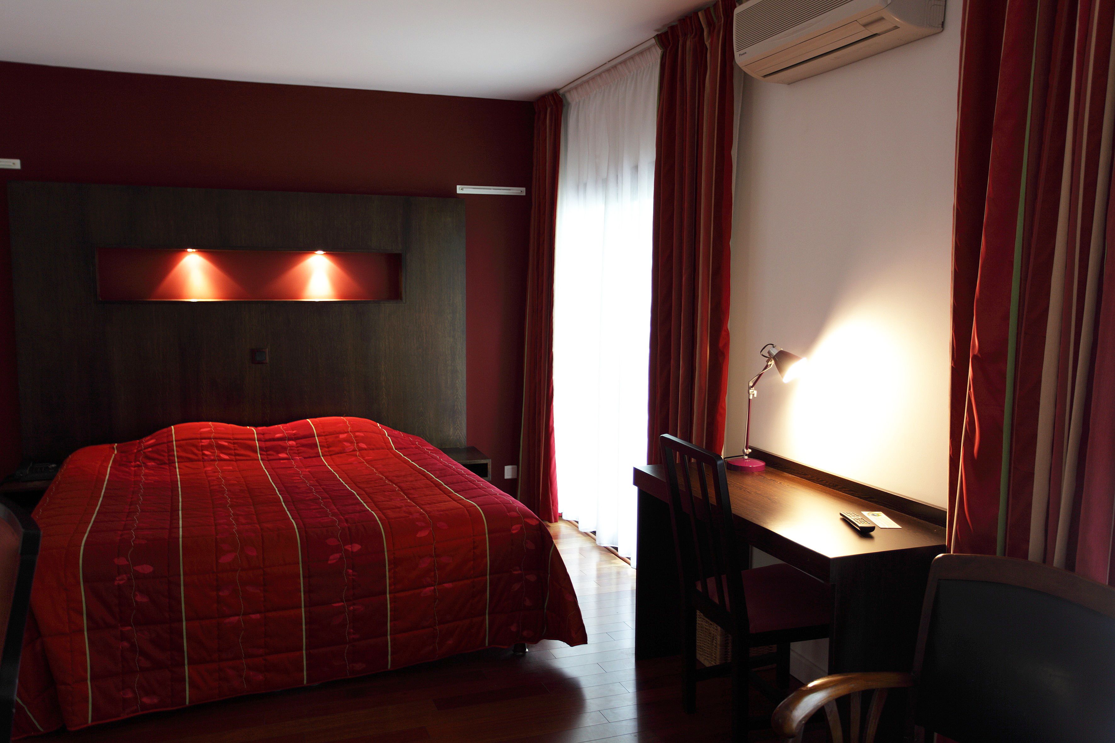 luxury suite | premium bedding, select comfort beds, desk, blackout curtains