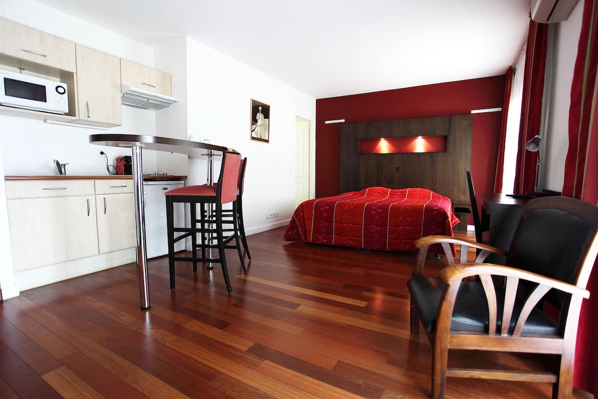 luxury suite | premium bedding, select comfort beds, desk, blackout curtains