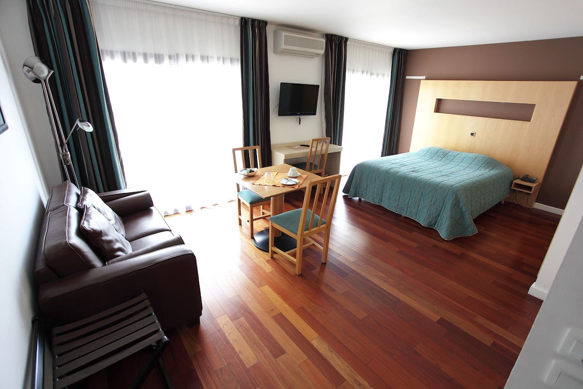 premium bedding, select comfort beds, desk, blackout curtains