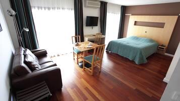 Premium bedding, Select Comfort beds, desk, blackout drapes