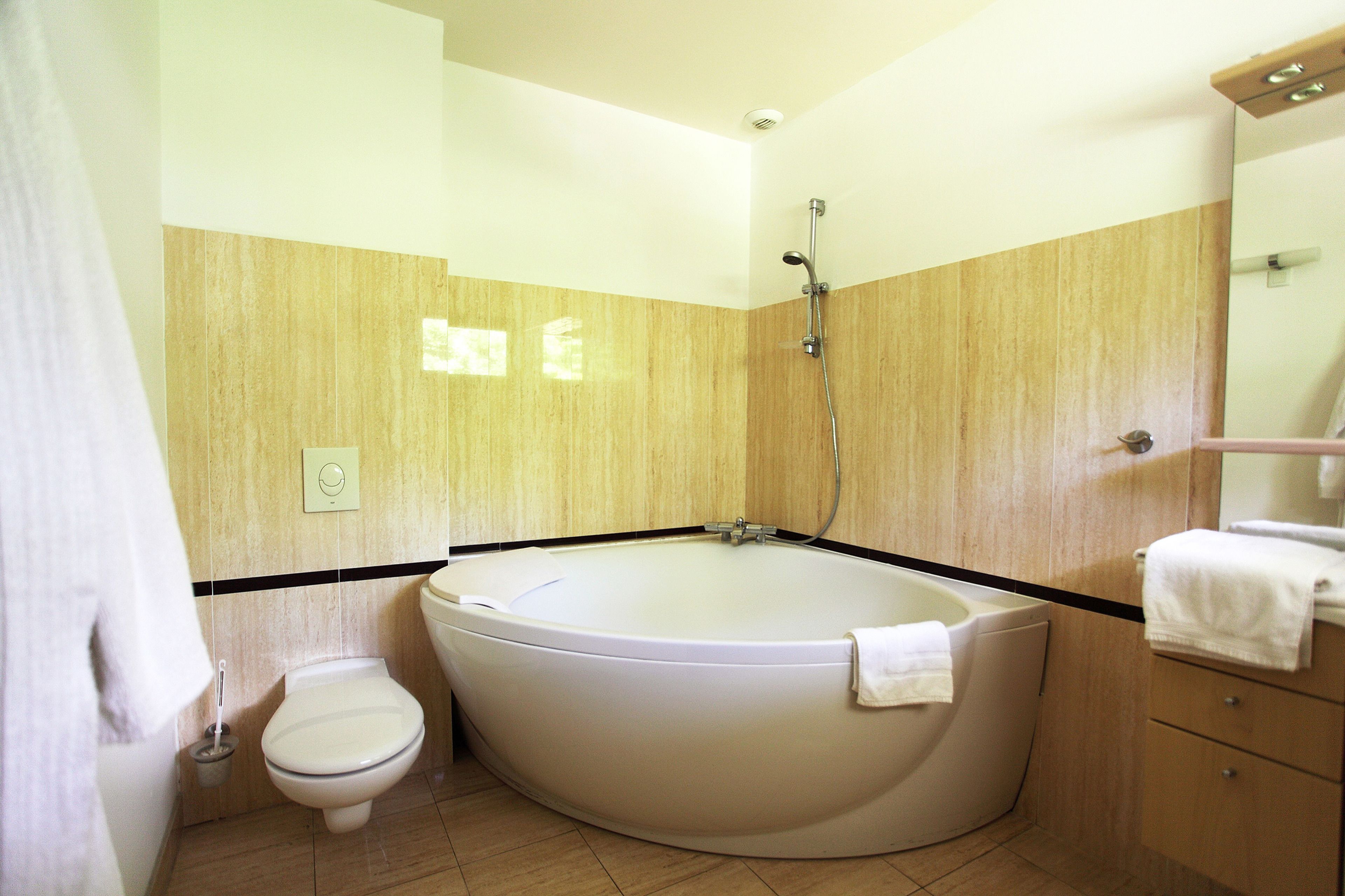 luxury suite | bathroom | free toiletries, hair dryer, towels