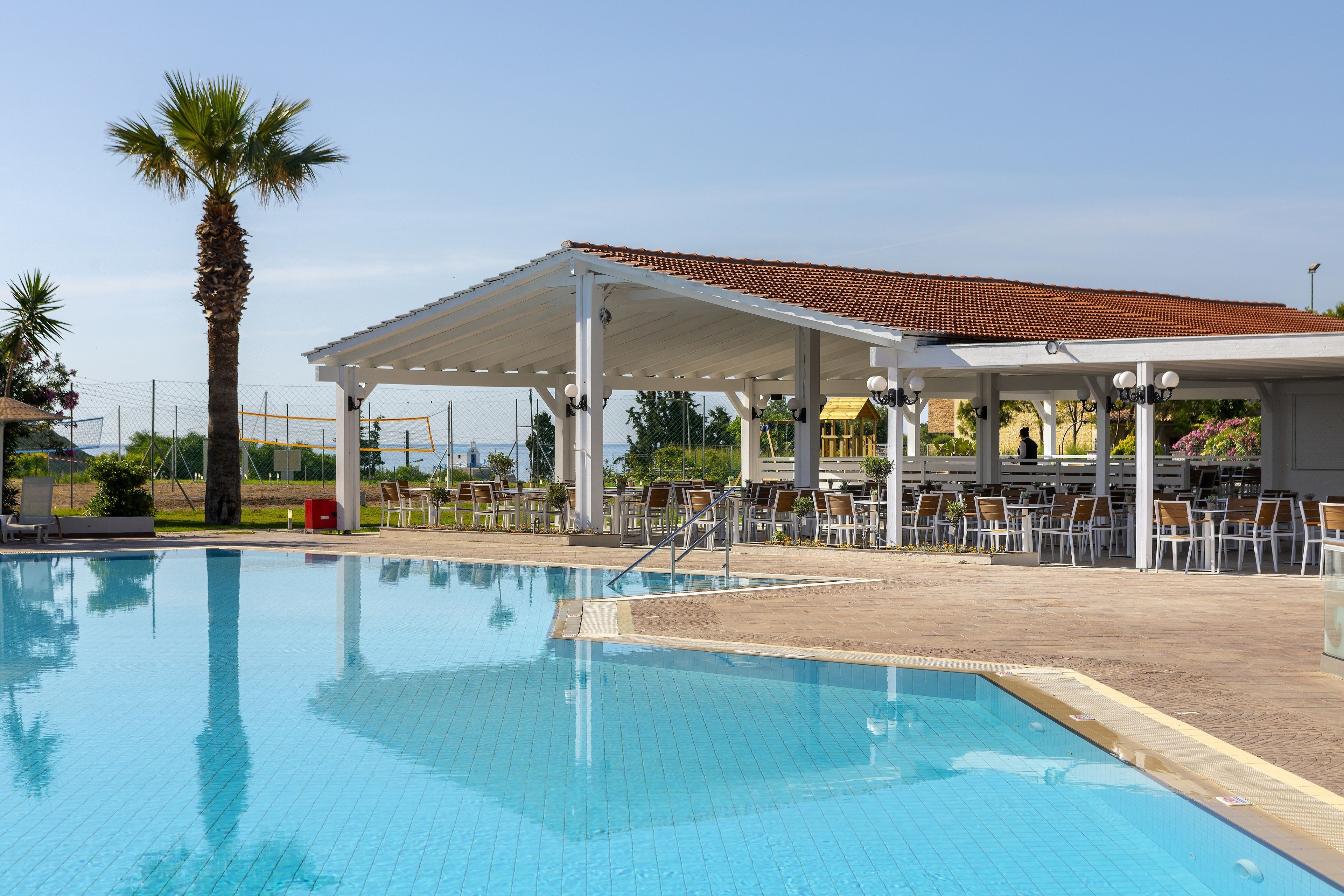 Outdoor pool, open 10:00 AM to 6:30 PM, pool umbrellas, sun loungers