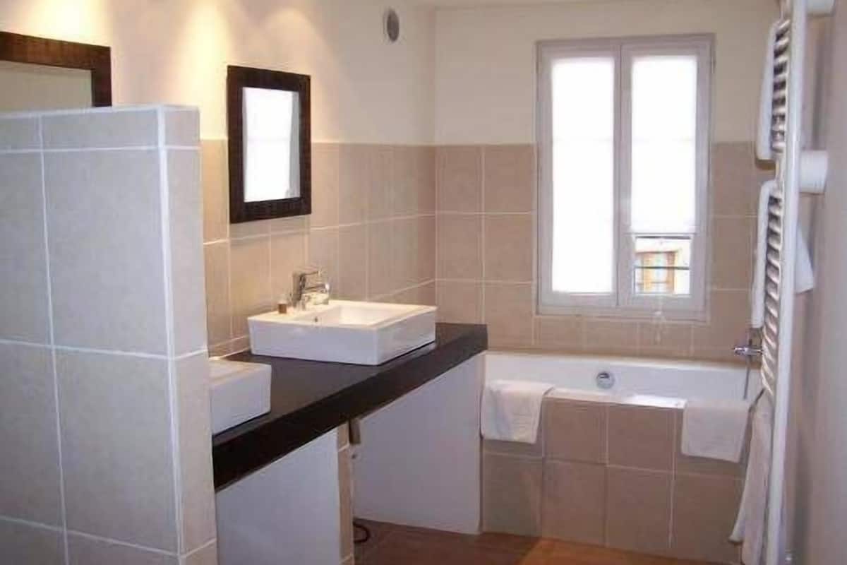 bathroom | hair dryer, towels, soap, shampoo