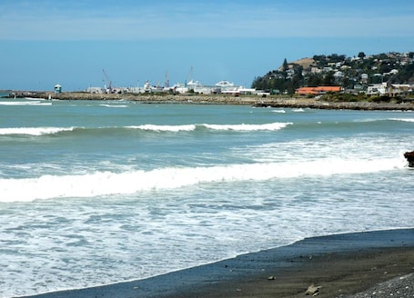 Arena negra, toallas de playa