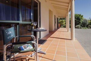 Premium Studio | Desk, laptop workspace, soundproofing, iron/ironing board