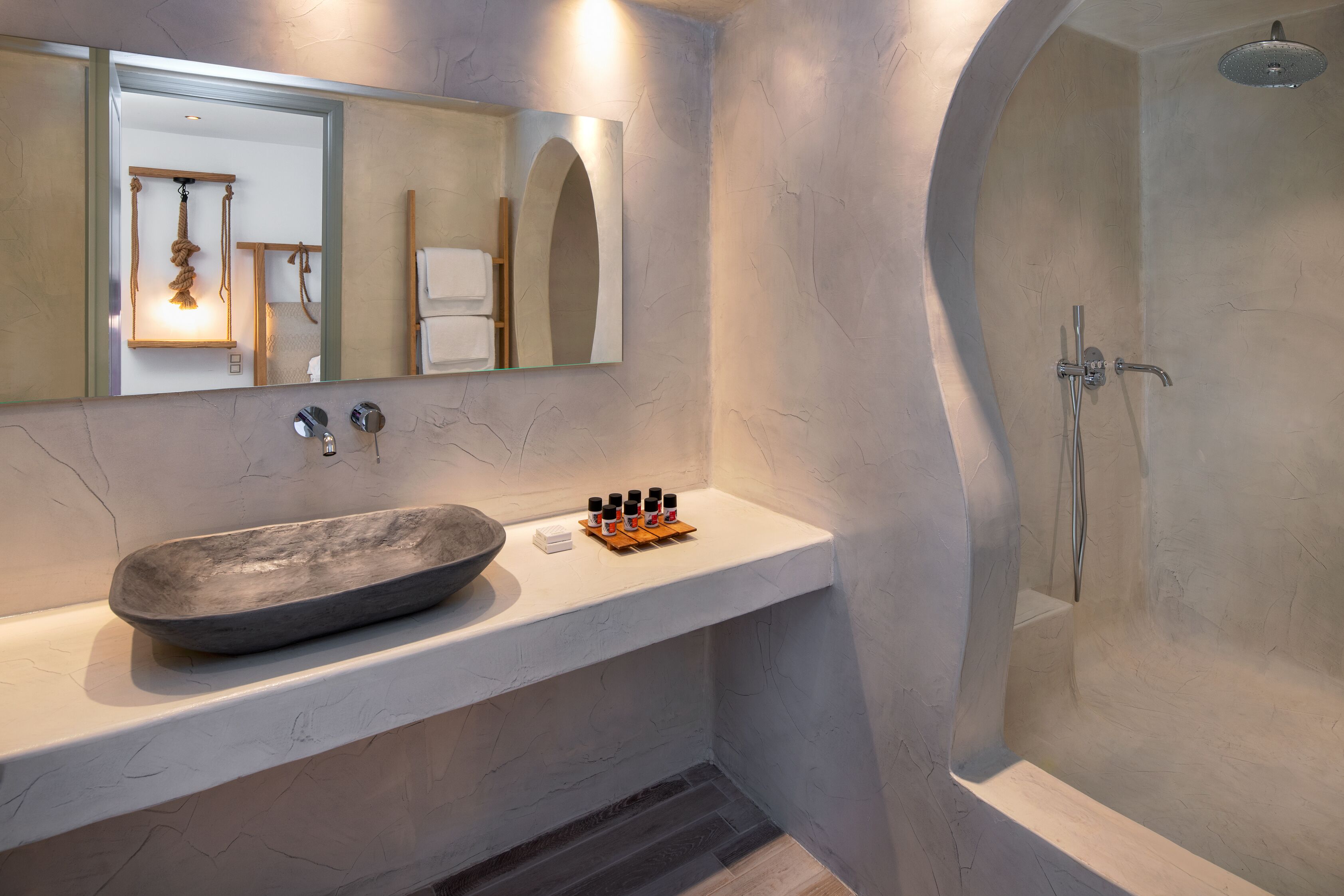 pool suite with sea view | bathroom | combined shower/bathtub, designer toiletries, hair dryer, bathrobes