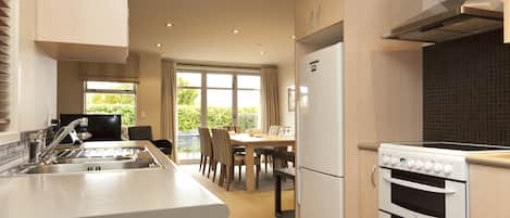 Suite, 3 Bedrooms, Jetted Tub | Private kitchen | Fridge, microwave, coffee/tea maker, electric kettle