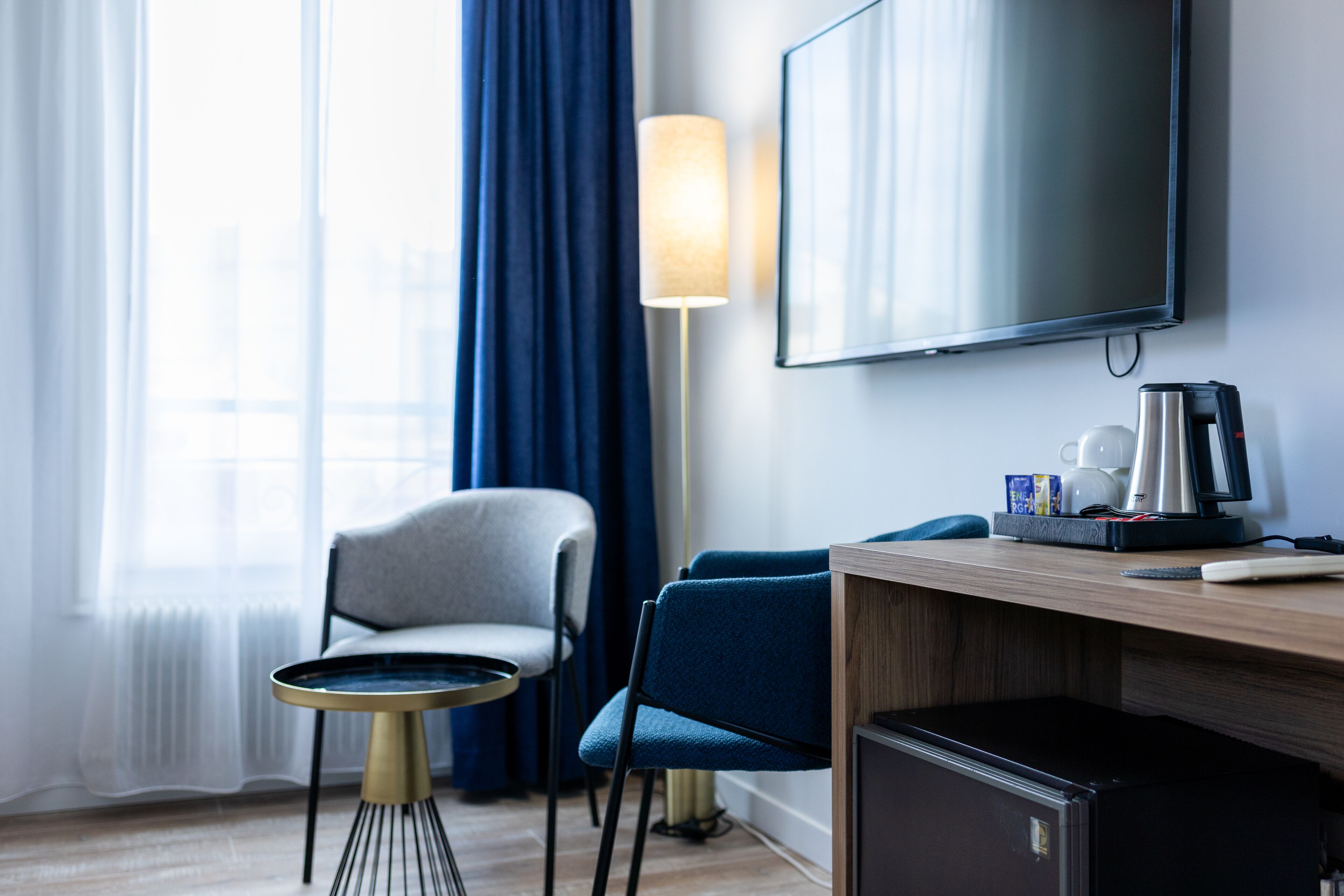 superior triple room, sea view | living area | 56-cm lcd tv with satellite channels, tv, offices