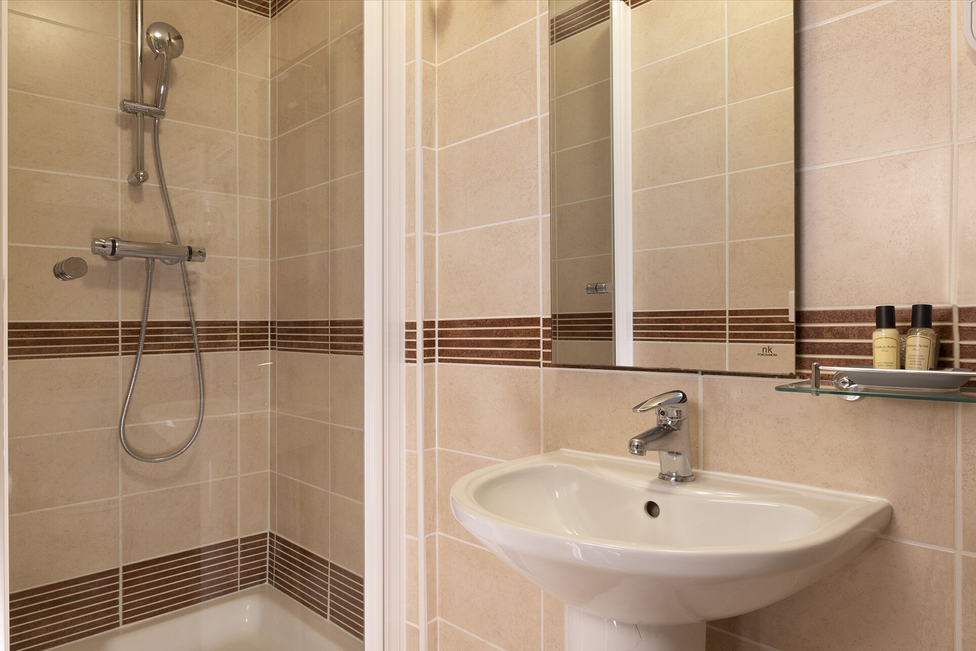 single room | bathroom | shower, hair dryer, towels