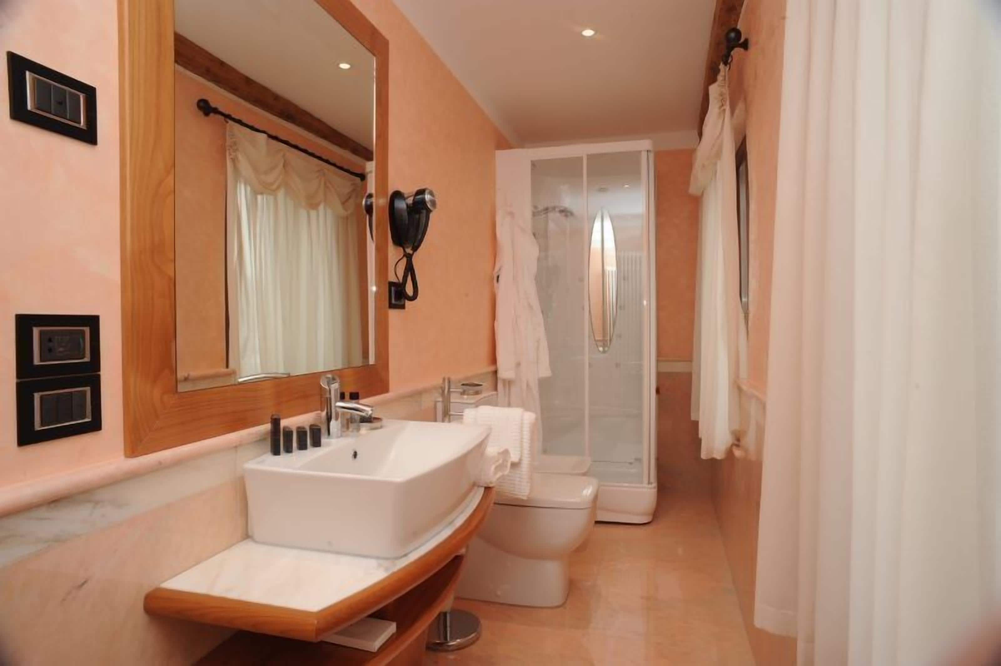 free toiletries, hair dryer, bathrobes, slippers