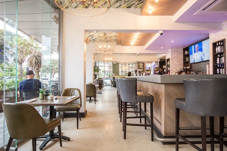 Bar (on property). Belaire Suites