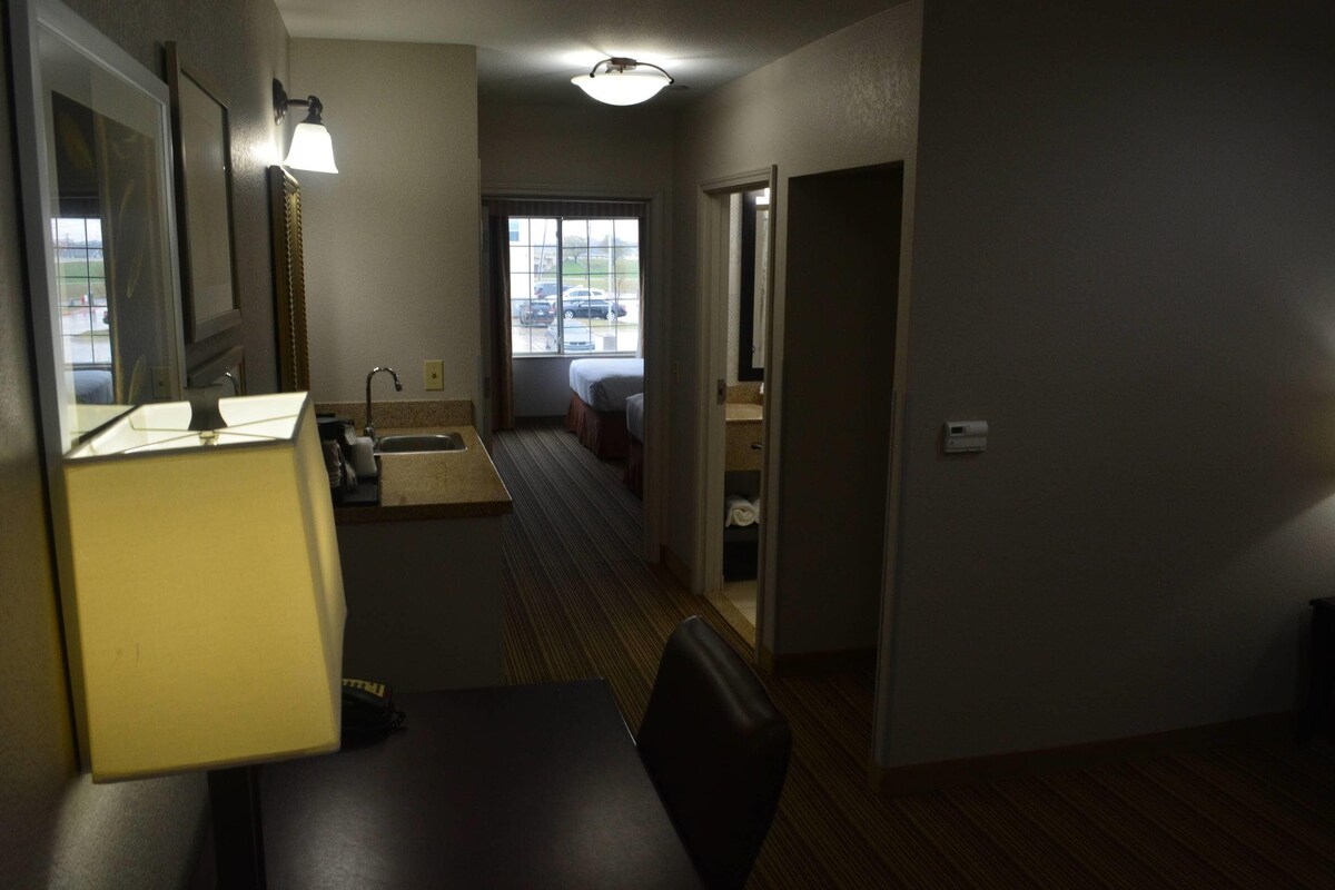 Suite, 1 King Bed, Non Smoking | Premium bedding, desk, iron/ironing board, free cots/infant beds