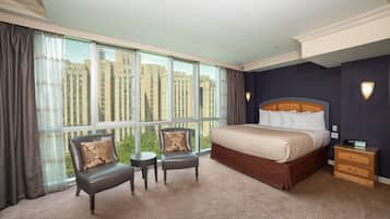 King Suite Deluxe | Pillow-top beds, in-room safe, desk, soundproofing
