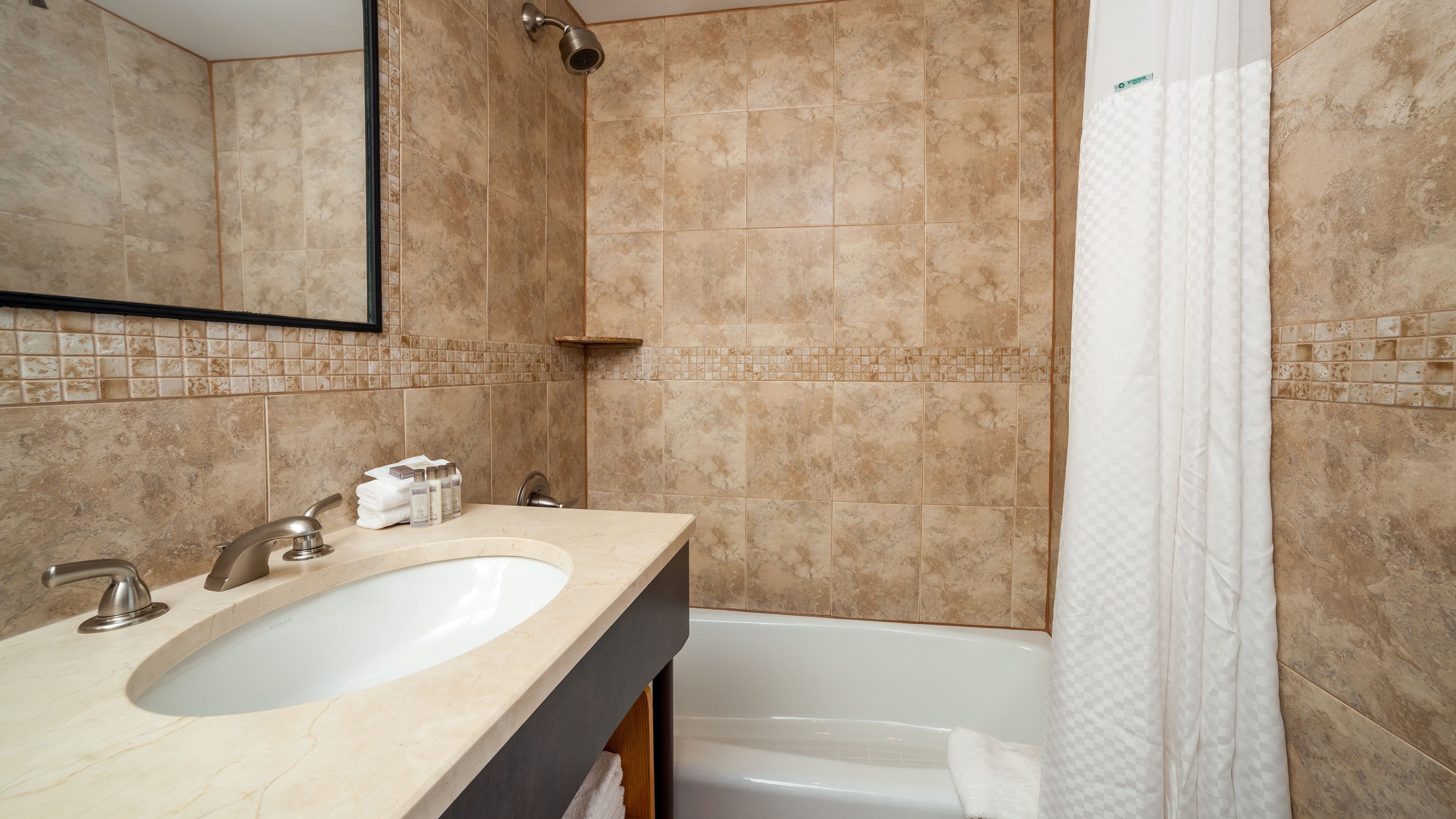 deluxe room, 2 queen beds, city view | bathroom | hair dryer, towels