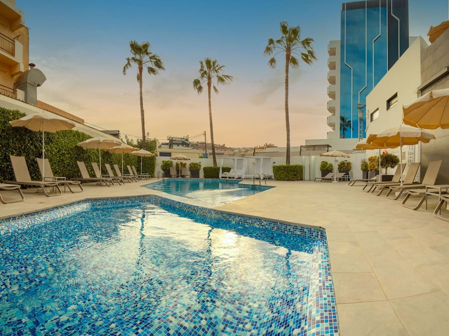 Outdoor pool, pool umbrellas, pool loungers