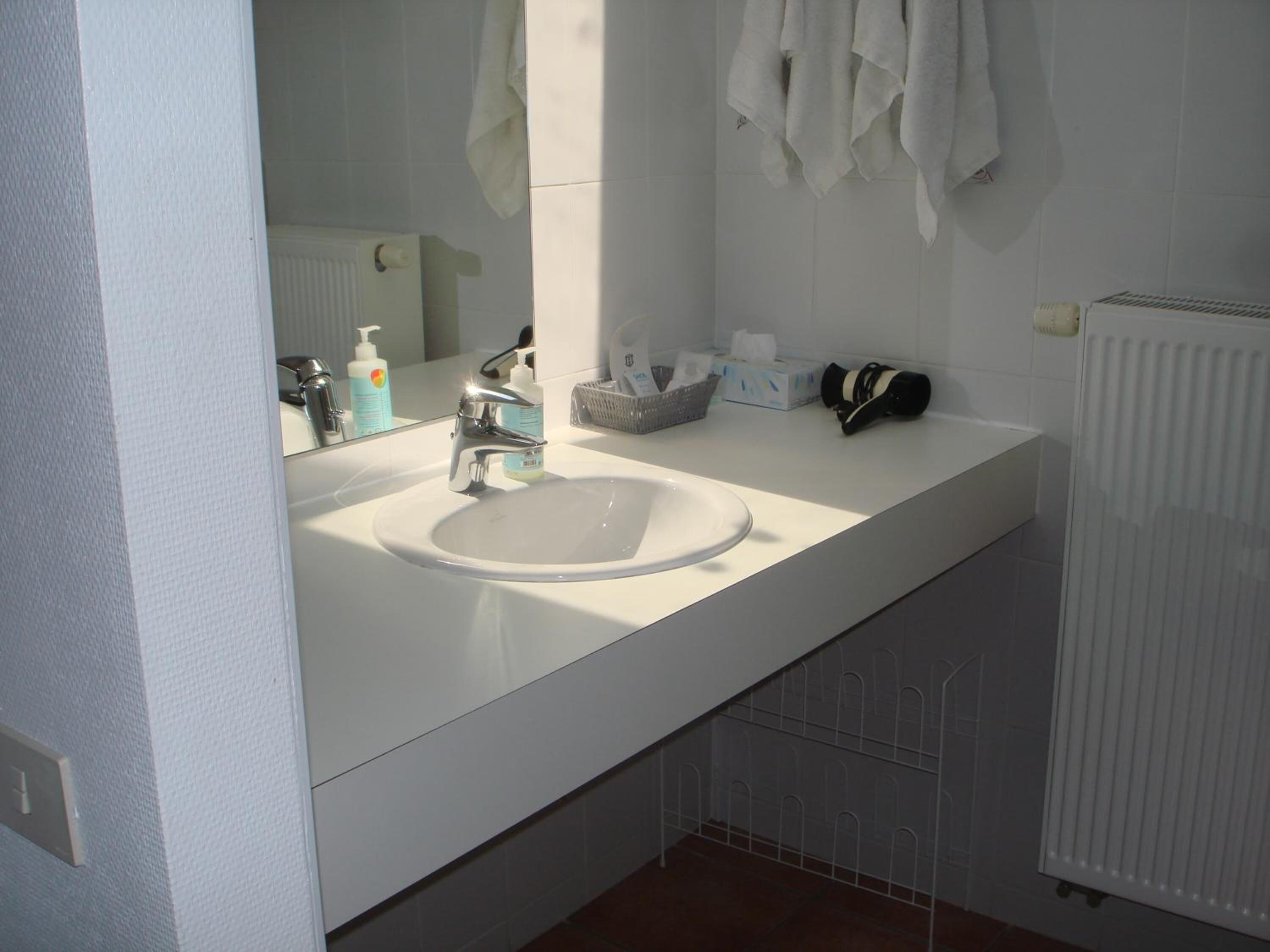 separate bathtub and shower, free toiletries, hair dryer, slippers