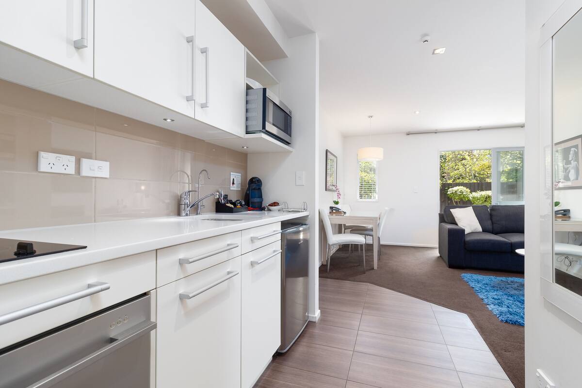 two bedroom presidential spa suite | private kitchen | fridge, microwave, stovetop, dishwasher