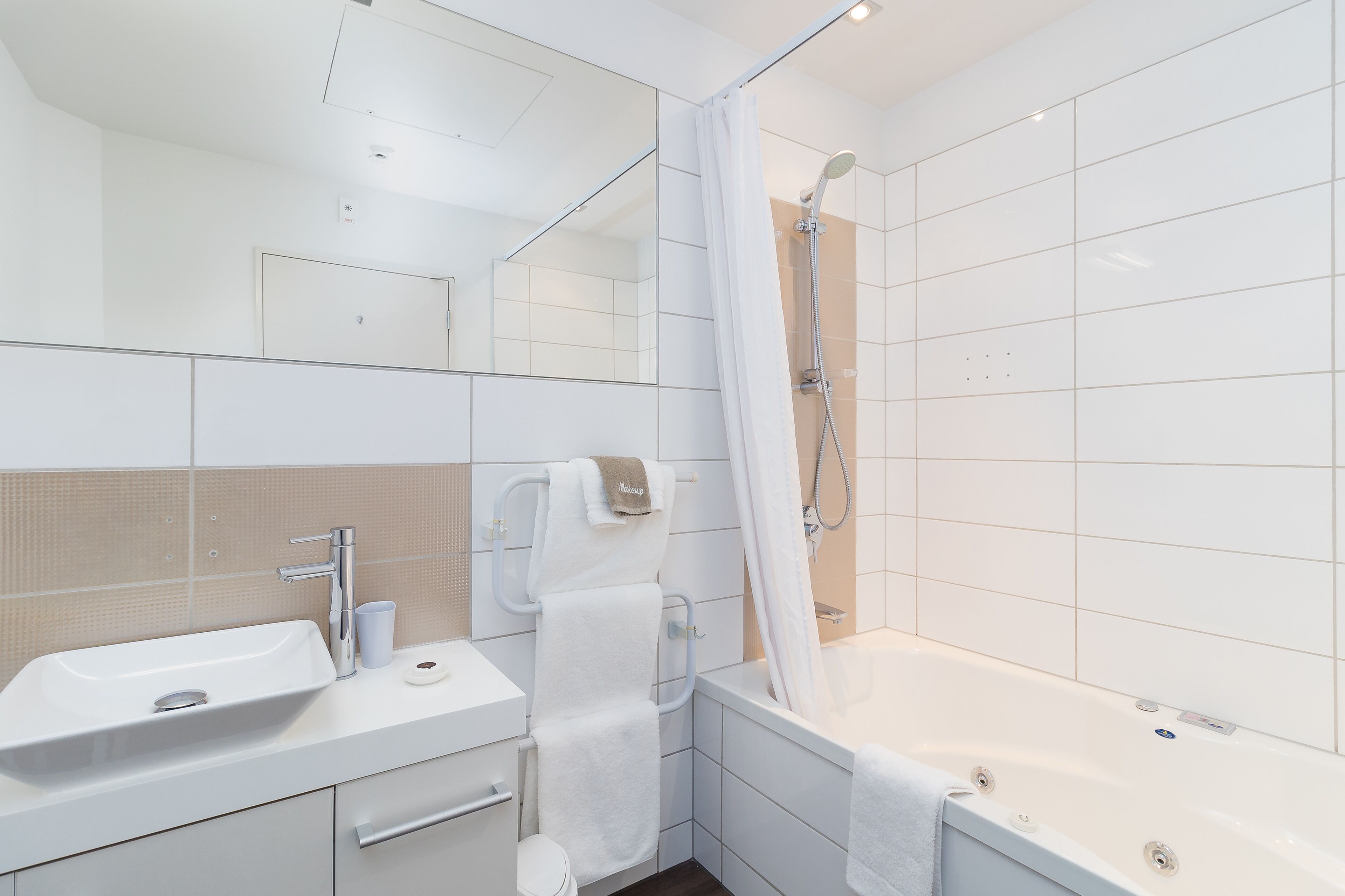 one bedroom ambassador spa suite | bathroom | shower, designer toiletries, hair dryer, towels