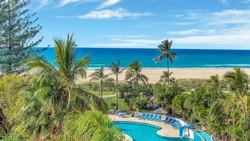 Outdoor pool, open 6:30 AM to 9:30 PM, free pool cabanas, pool umbrellas