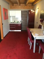 Classic Triple Room | Living area | 32-inch flat-screen TV with digital channels, TV